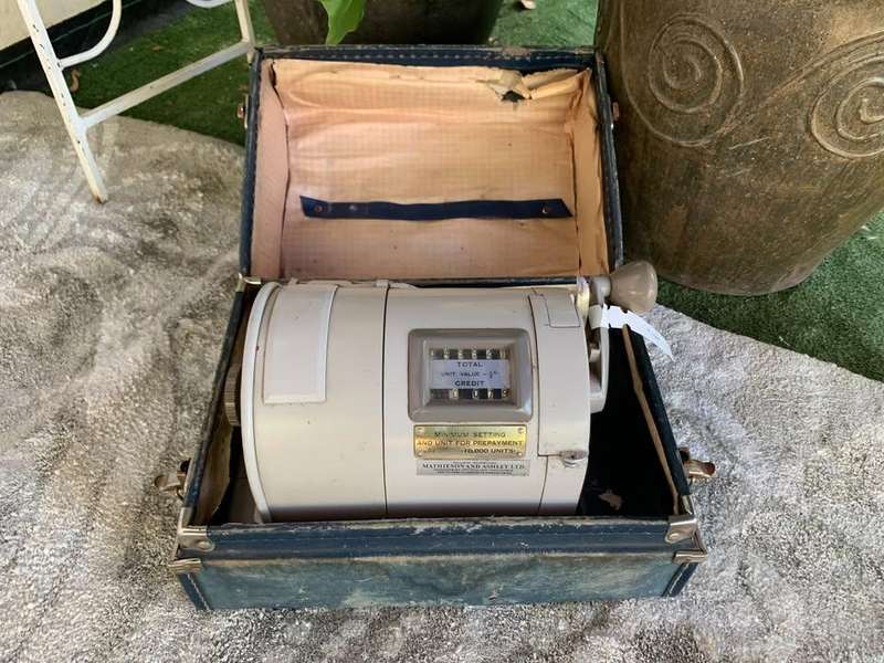 Antique franking machine in its original box