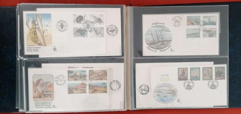 Album with lots of SWA fdc's, mini sheets & dated stamp sets