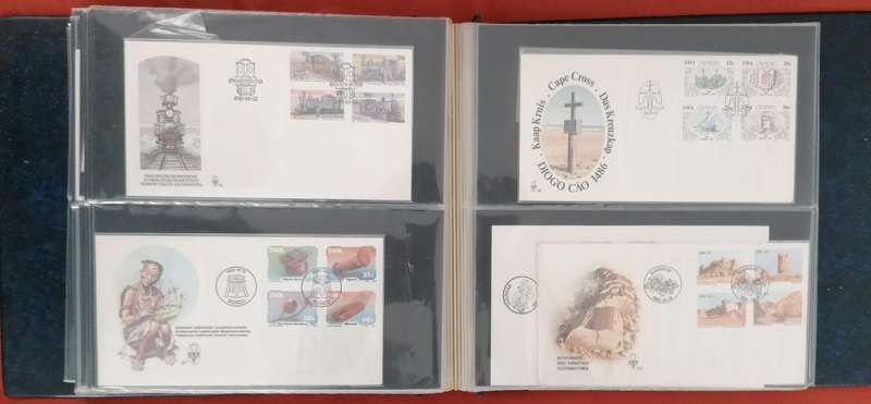 Album with lots of SWA fdc's, mini sheets & dated stamp sets