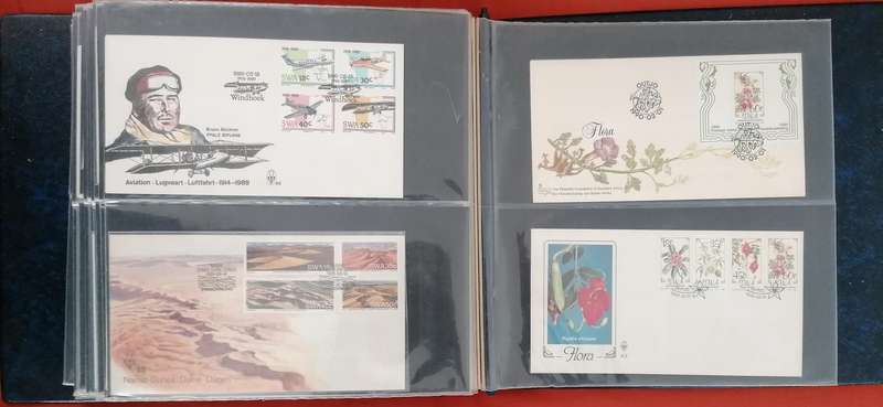 Album with lots of SWA fdc's, mini sheets & dated stamp sets