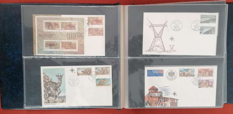 Album with lots of SWA fdc's, mini sheets & dated stamp sets