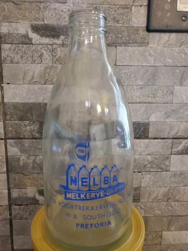 Vintage Melba afrikaans glass milk bottle