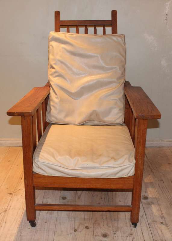 Morris chair with cream leather cushions