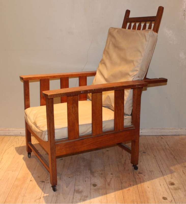 Morris chair with cream leather cushions
