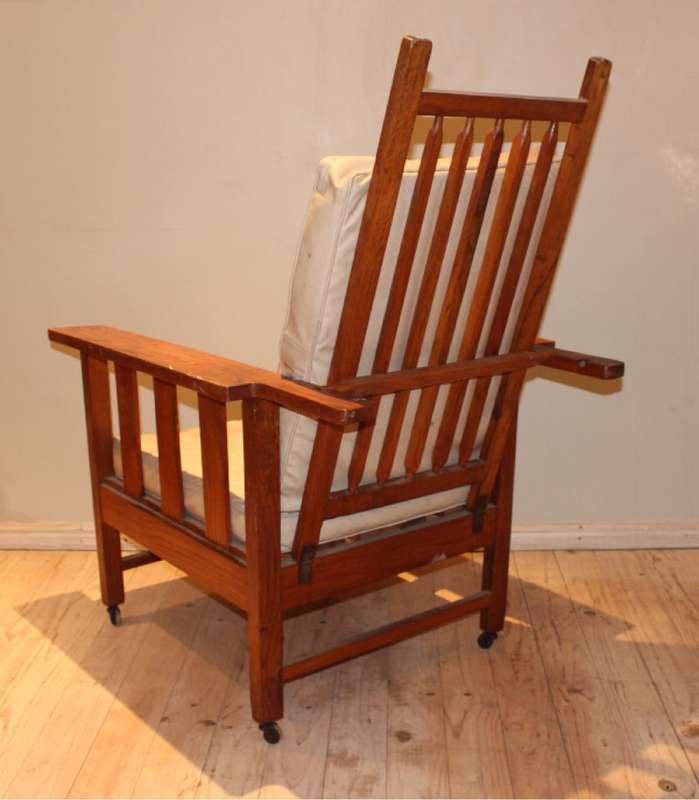 Morris chair with cream leather cushions