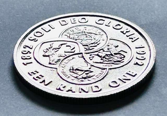 South African 1992 One Rand, 100th Anniversary, UNC, Soli Deo Gloria UNC in red SAM mint box