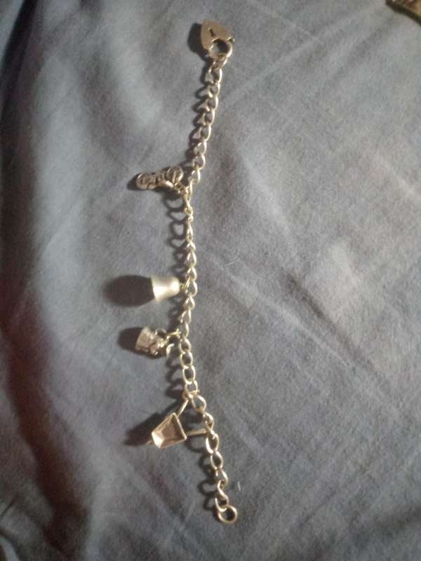 Vintage sterling silver charmed brecelete