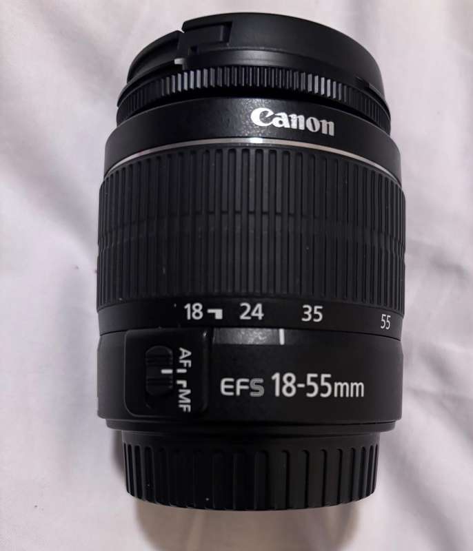 Canon 250D  with double lens kit and camera bag