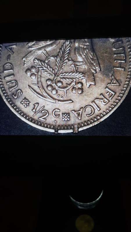 1961 South African half cent coin with very unique and scarce ERRORS parallel clip rim clipping