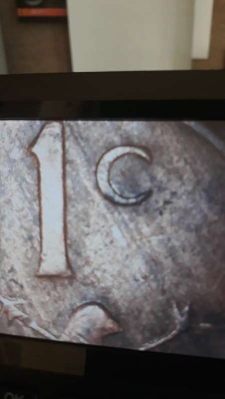 1975 South African one cent coin with die breaks and incorrect Copper, zinc and tin combinations