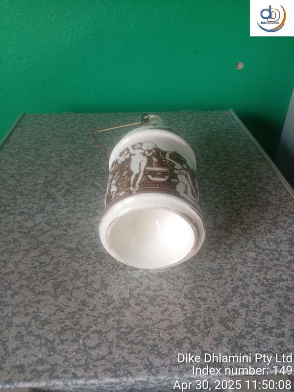 Vintage stoneware "RUM" crock specifically identified as East India Rum crock