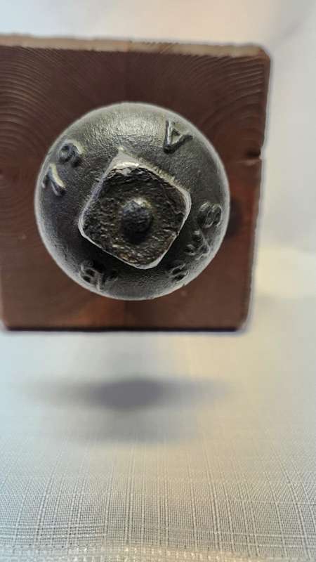 Wood door stopper with railway coach screw