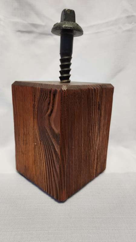 Wood door stopper with railway coach screw