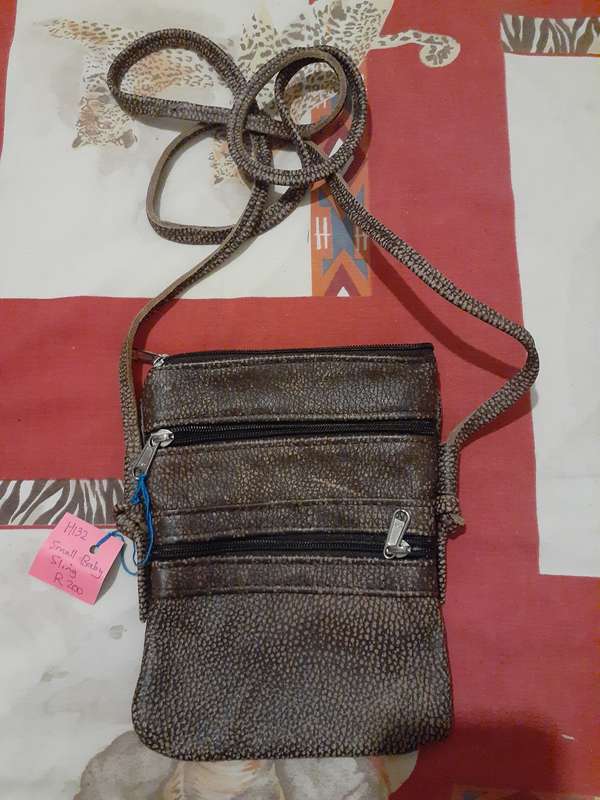 Geniune leather Small Baby slingbag with 2 zips