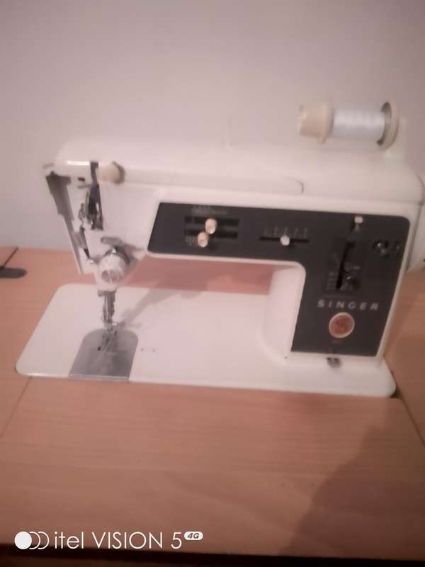 Sewing machine with built in cubord
