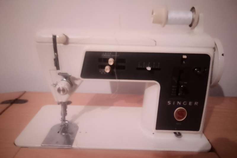 Sewing machine with built in cubord