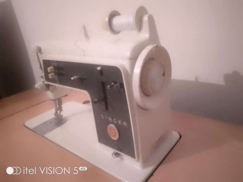Sewing machine with built in cubord