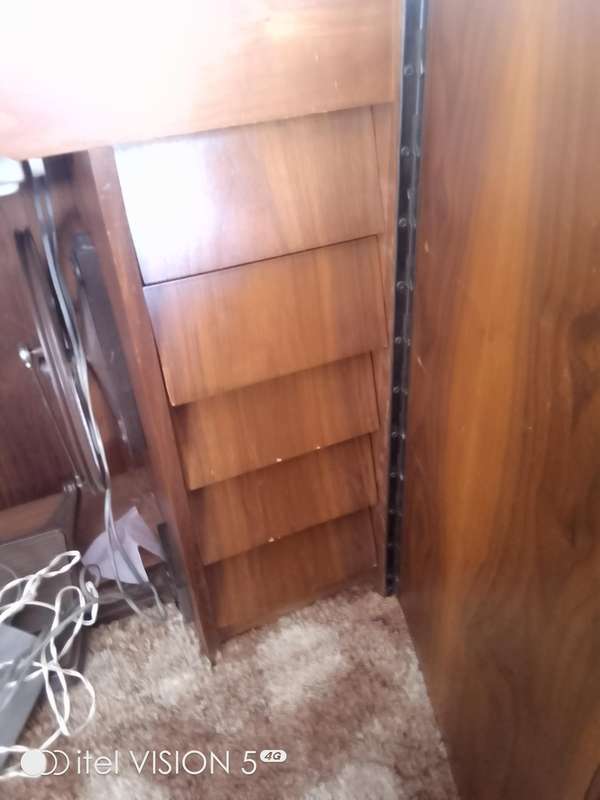 Sewing machine with built in cubord