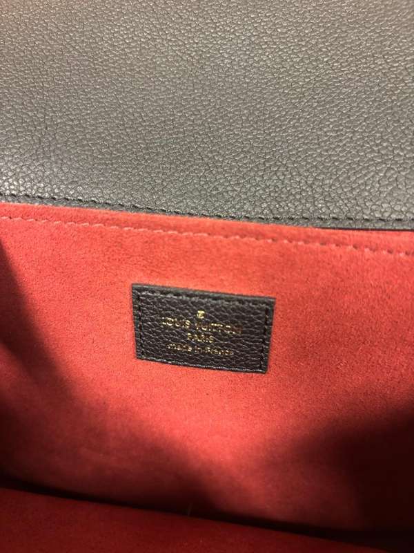 LOUIS VUITTON Empreinte Monogram Giant Pochette Metis