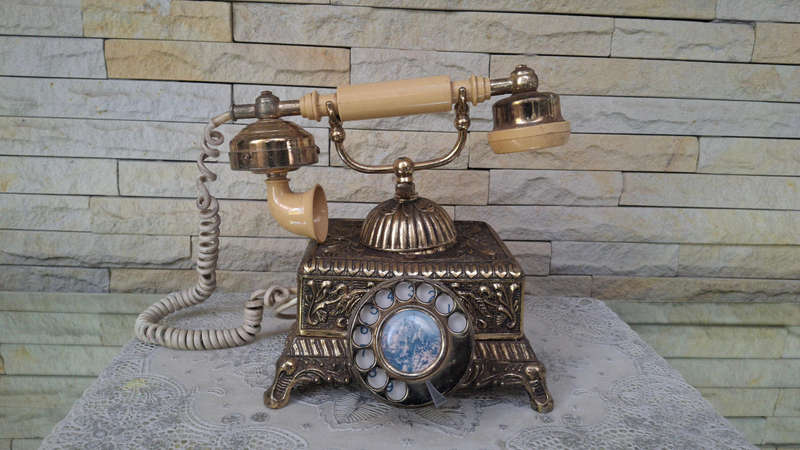 Vintage-style rotary dial telephone