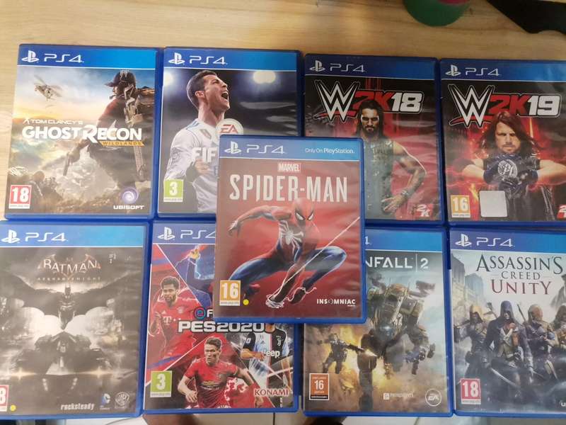 09 PS4 GAMES (GOOD CONDITION), SPIDERMAN PS4, FIFA, WWE, ASSASSIN'S CREED, BATMAN