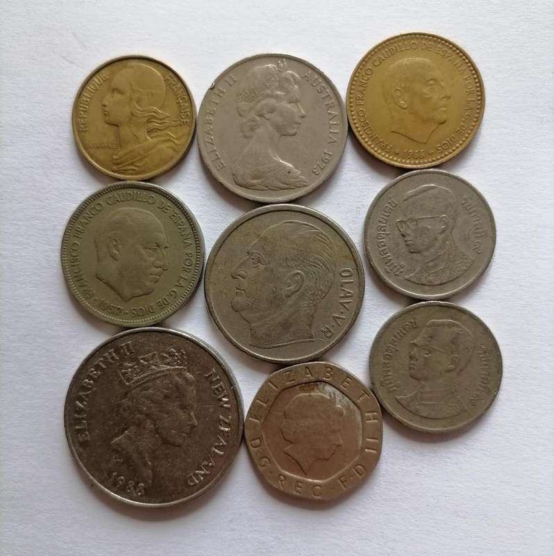 Lot of 9 World Coins Featuring Portraits & Busts  Europe, Asia & Oceania (1960s2000s)