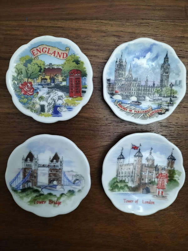 Miniature 4 piece decorative plates made of Bone China featuring England