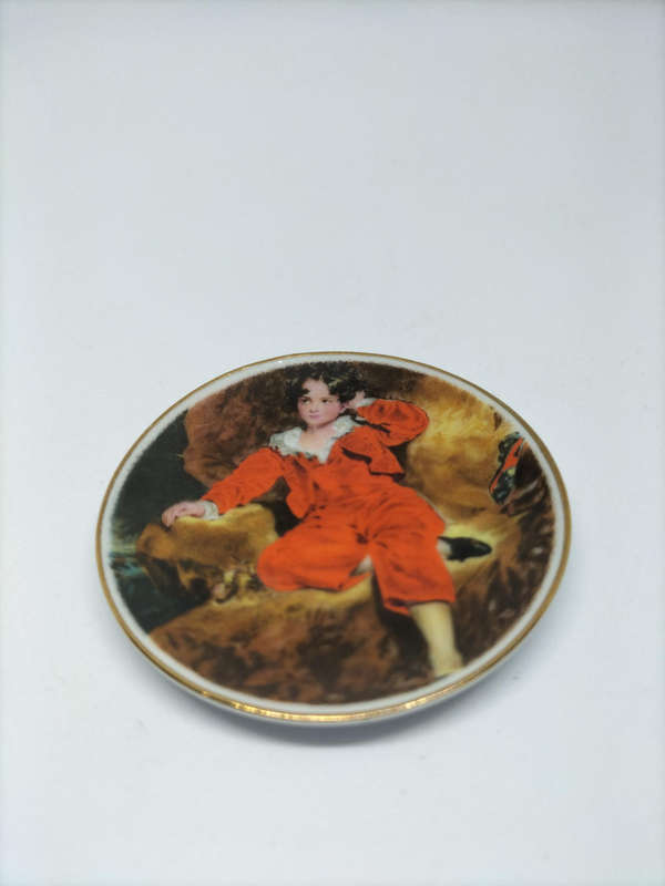 Collectors item-Decorative Ceramic Plate Featuring "The Red Boy"