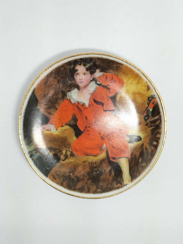 Collectors item-Decorative Ceramic Plate Featuring "The Red Boy"