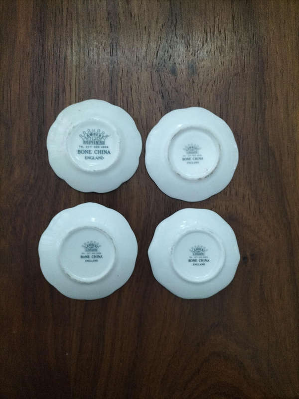 Miniature 4 piece decorative plates made of Bone China featuring England
