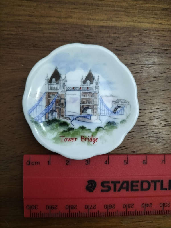 Miniature 4 piece decorative plates made of Bone China featuring England