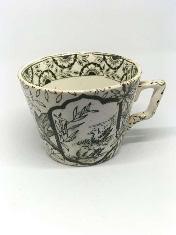 Antique Teacup and Saucer Set