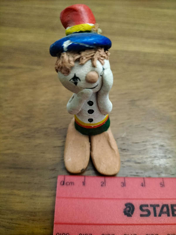 Vintage pottery clown figurine