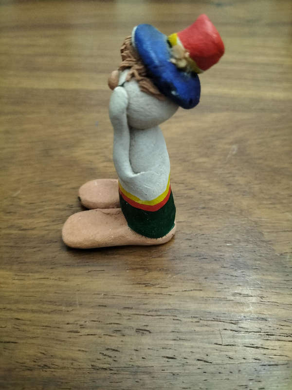 Vintage pottery clown figurine