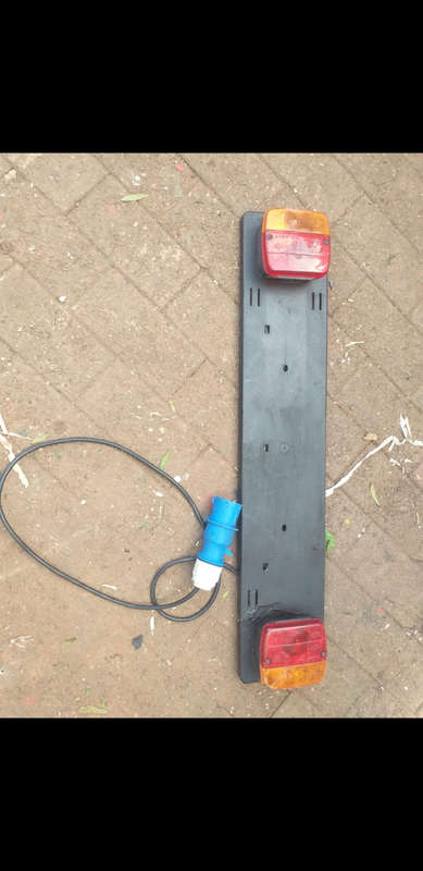 Trailer rear plug