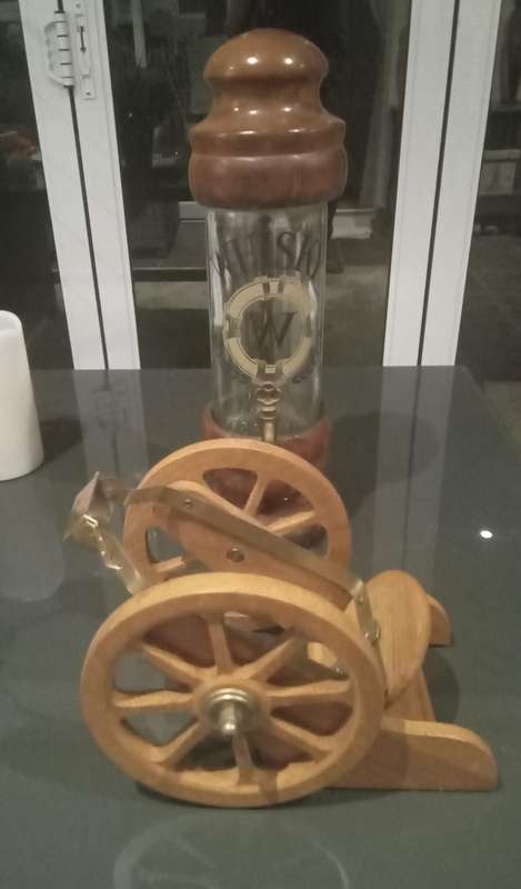 ANTIQUE WHISKEY DISPENSER AND THREE SHIPS WHISKEY BOTTLE CANON HOLDER