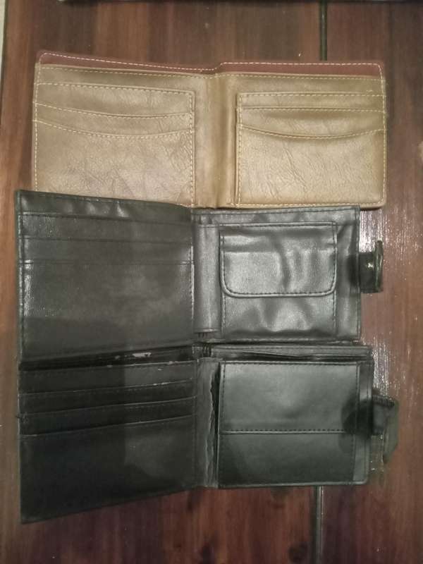 ASSORTED WALLETS (THREE) LIKE NEW