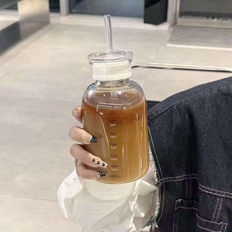 JUNIOR TRANDING / NEW 500ML 2 NI1 GLASS BOTTLE WITH STRAW LID