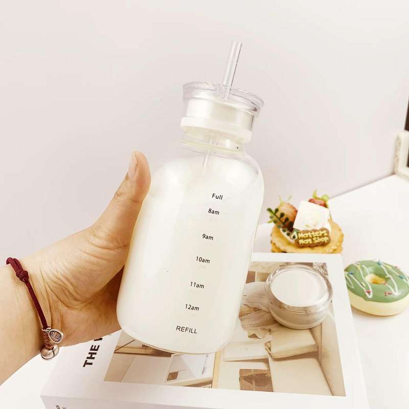 JUNIOR TRANDING / NEW 500ML 2 NI1 GLASS BOTTLE WITH STRAW LID
