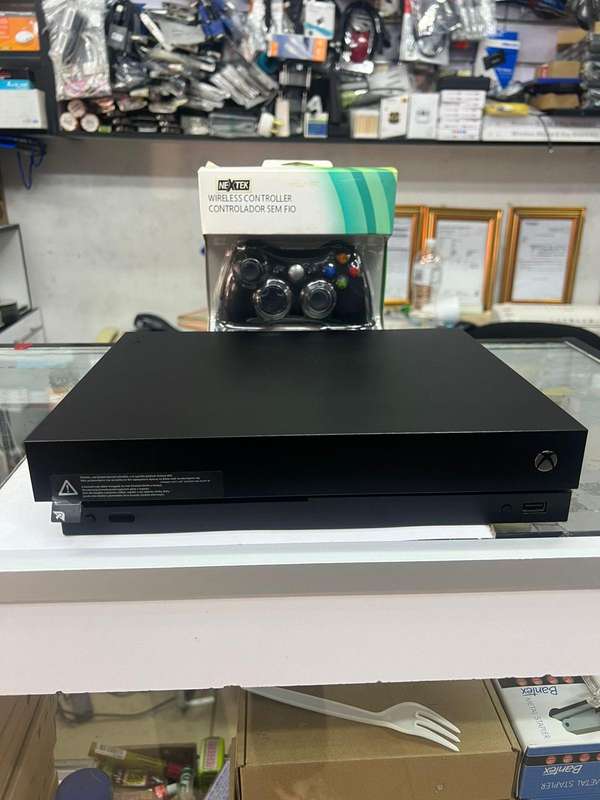 XBOX ONE X WITH 2 CONTROLLERS