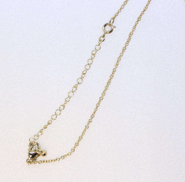 Black and Gold Pendant Necklace with Heart Shaped Pendant by Avon