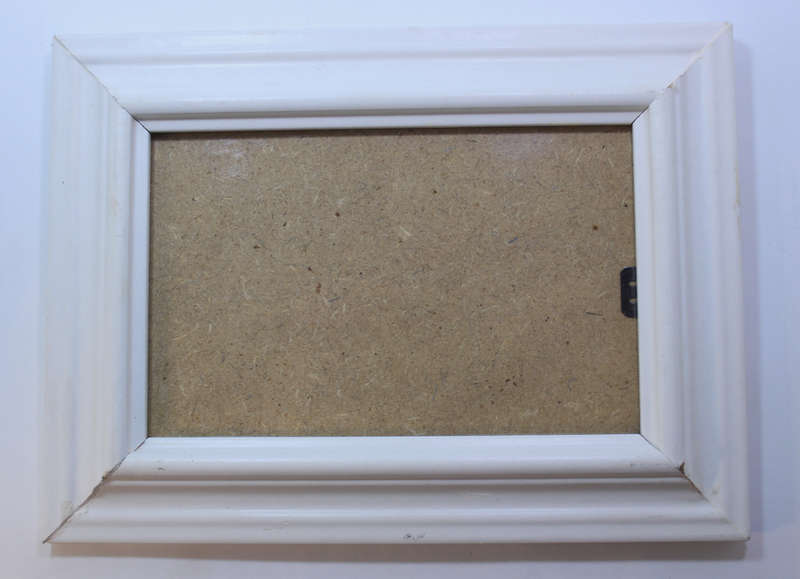 Three Various Sized White Photo Frames With Stands