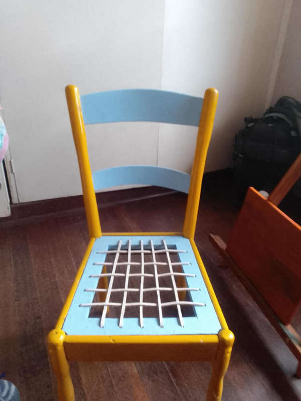 Antique painted chair with riempie modification