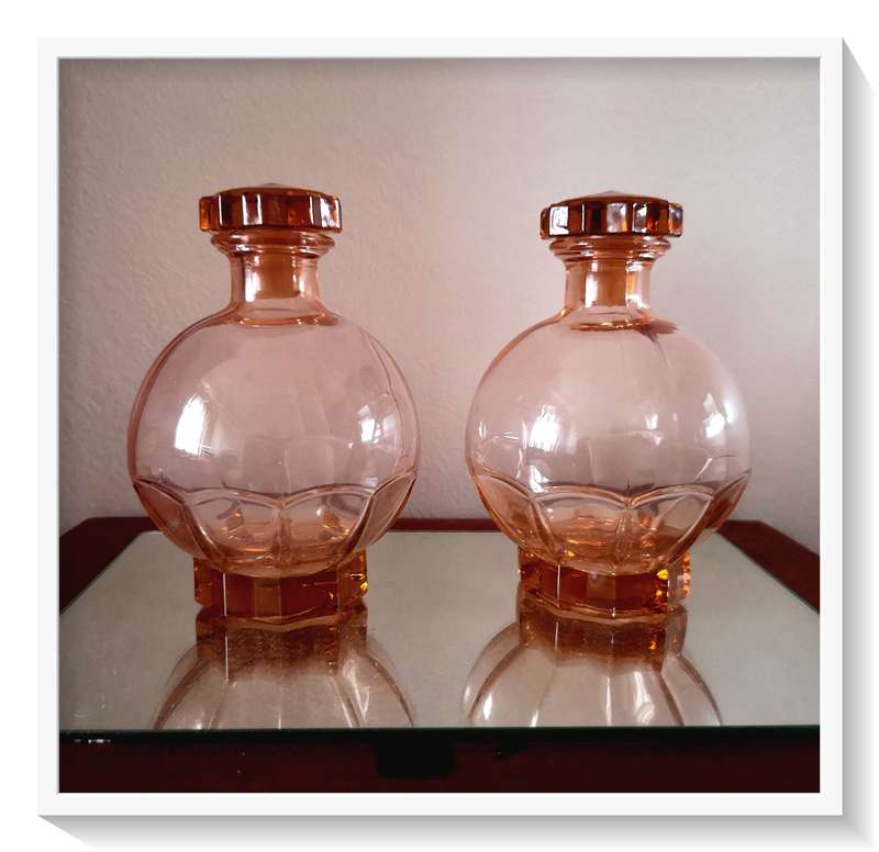A Pair of Charming Spherical Art Deco Style Translucent Pink Bottles Dimensions 150mm by 100mm