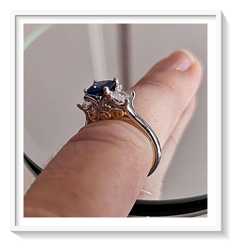 A Spectacular Sterling Silver Ring with Zircons and Vivid Blue Simulated Stone - Size 7 For Her