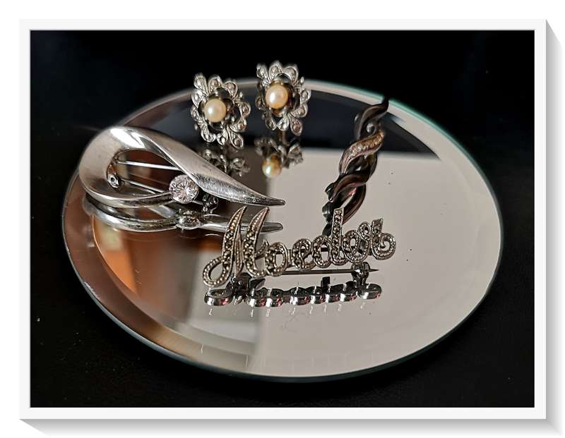 A Trio of Vintage Brooches studded with Glass Diamante and a Pair of Faux Pearl Earrings