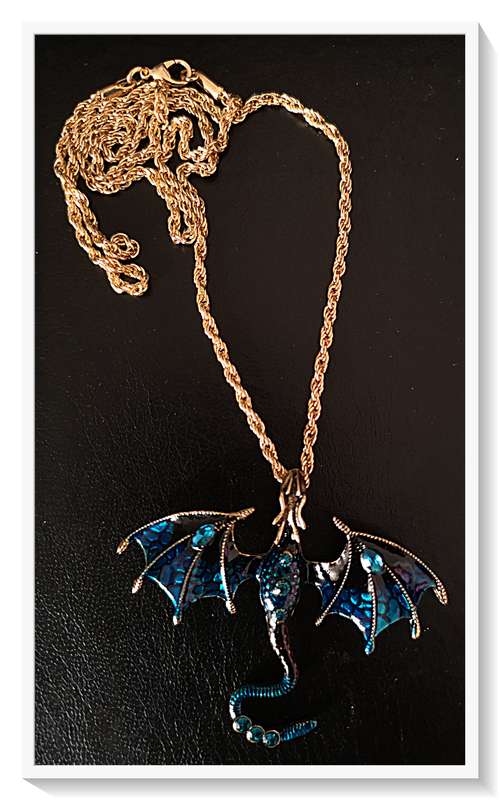 A Whimsical Deep Blue Dragon Necklace Metal Pendant with Simulated Blue Diamante and Enamel Coating