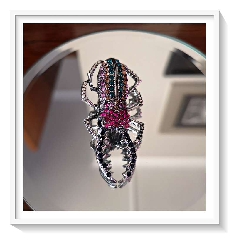 An Elegant Glitzy and Glamarous Metal and Rhinestone studded Stag Beetle Brooch - Condition: New