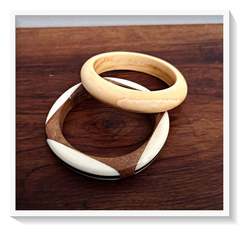 Two Ivory Toned Bangles made from Horn and Wood and Polished Resin
