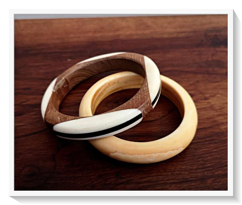 Two Ivory Toned Bangles made from Horn and Wood and Polished Resin